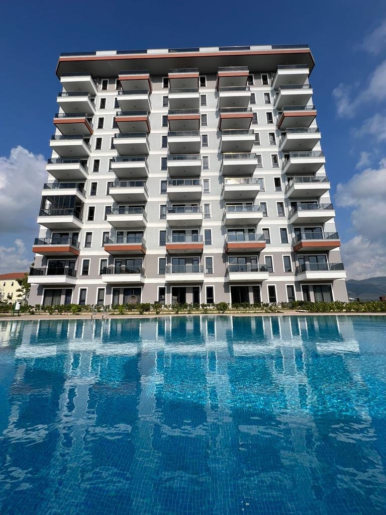 Квартира 1+1 с мебелью и видом на море в открытом для внж районе Демирташ